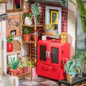 Rolife Emily's Flower Shop shelves and bouquets add depth to your mini scene.