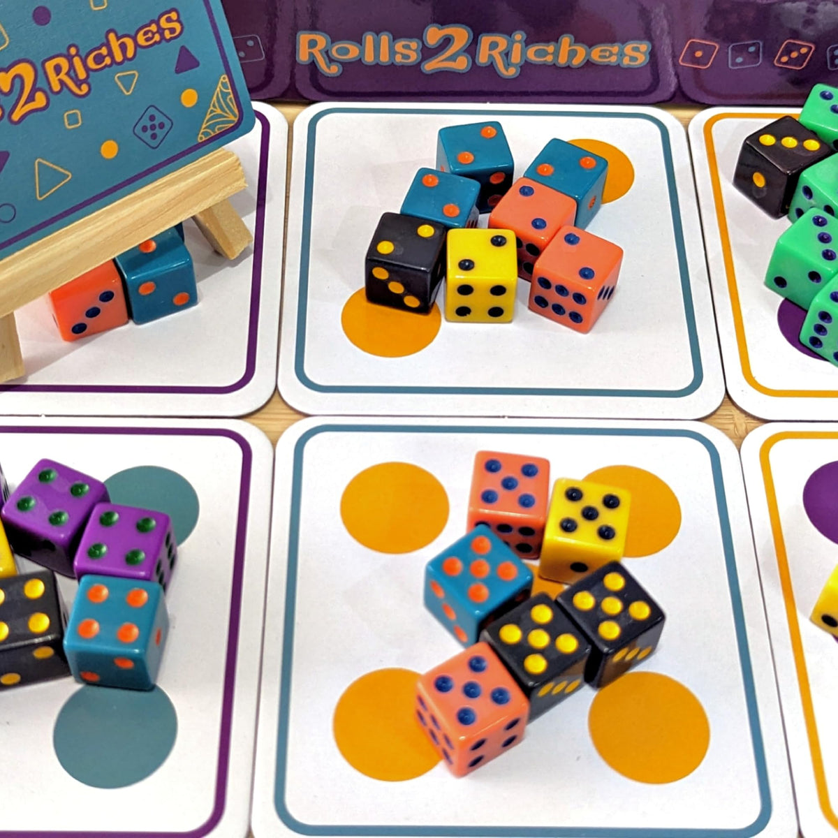 Rolls 2 Riches compact travel case for on-the-go play.