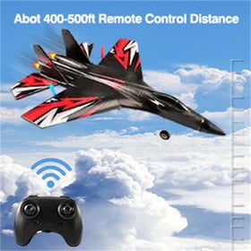 RoofWorld SU27 RC airplane night flight with glowing lights for visibility.