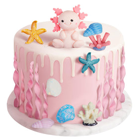 RoundFunny axolotl cake topper adds a cute focal point to ocean-themed celebrations.