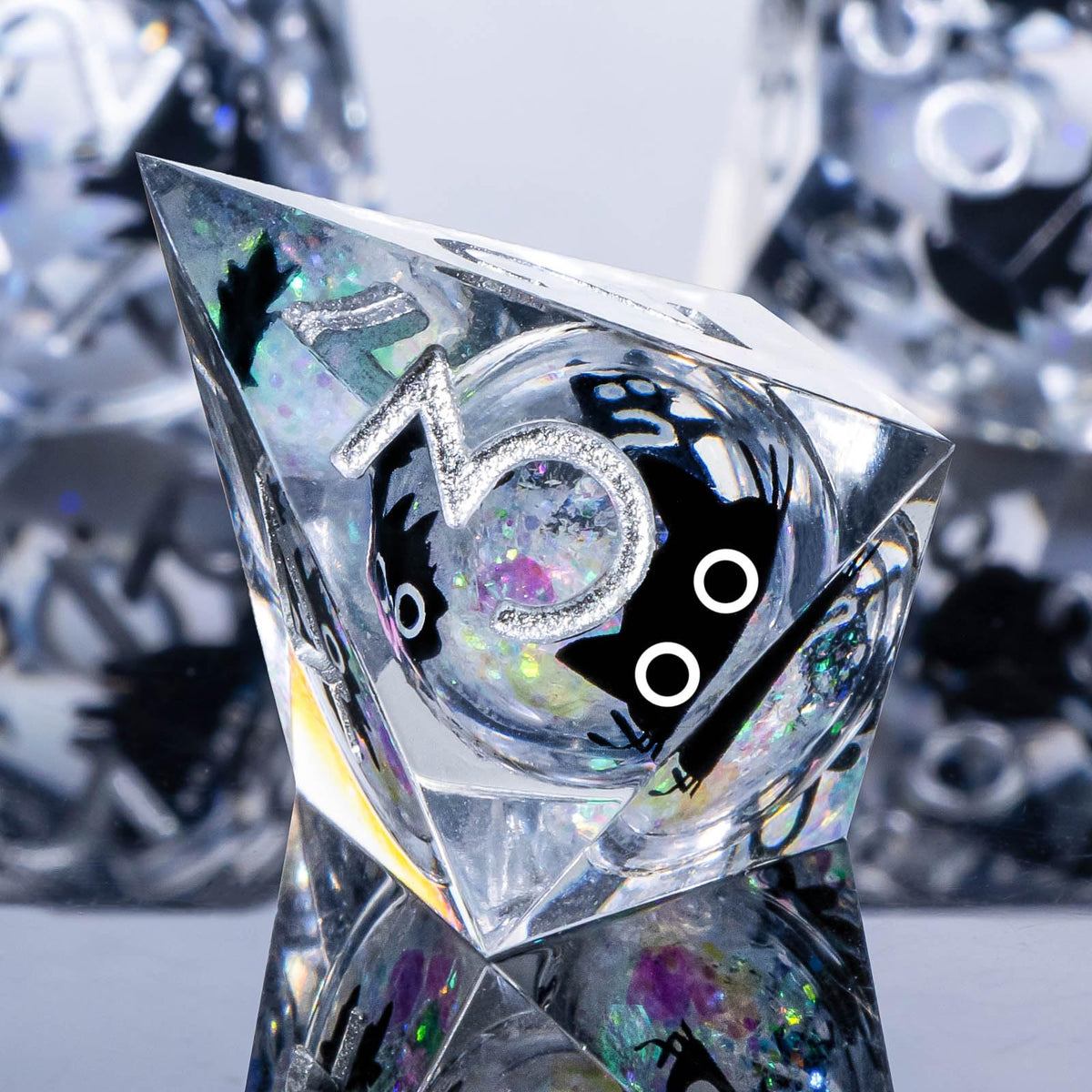 Cat-themed Roycevon DND dice placed on a table for immersive gameplay.