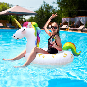 Rtudan unicorn pool float in water on a sunny beach day