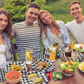 RVXHUA outdoor party scene with race-themed dinnerware.