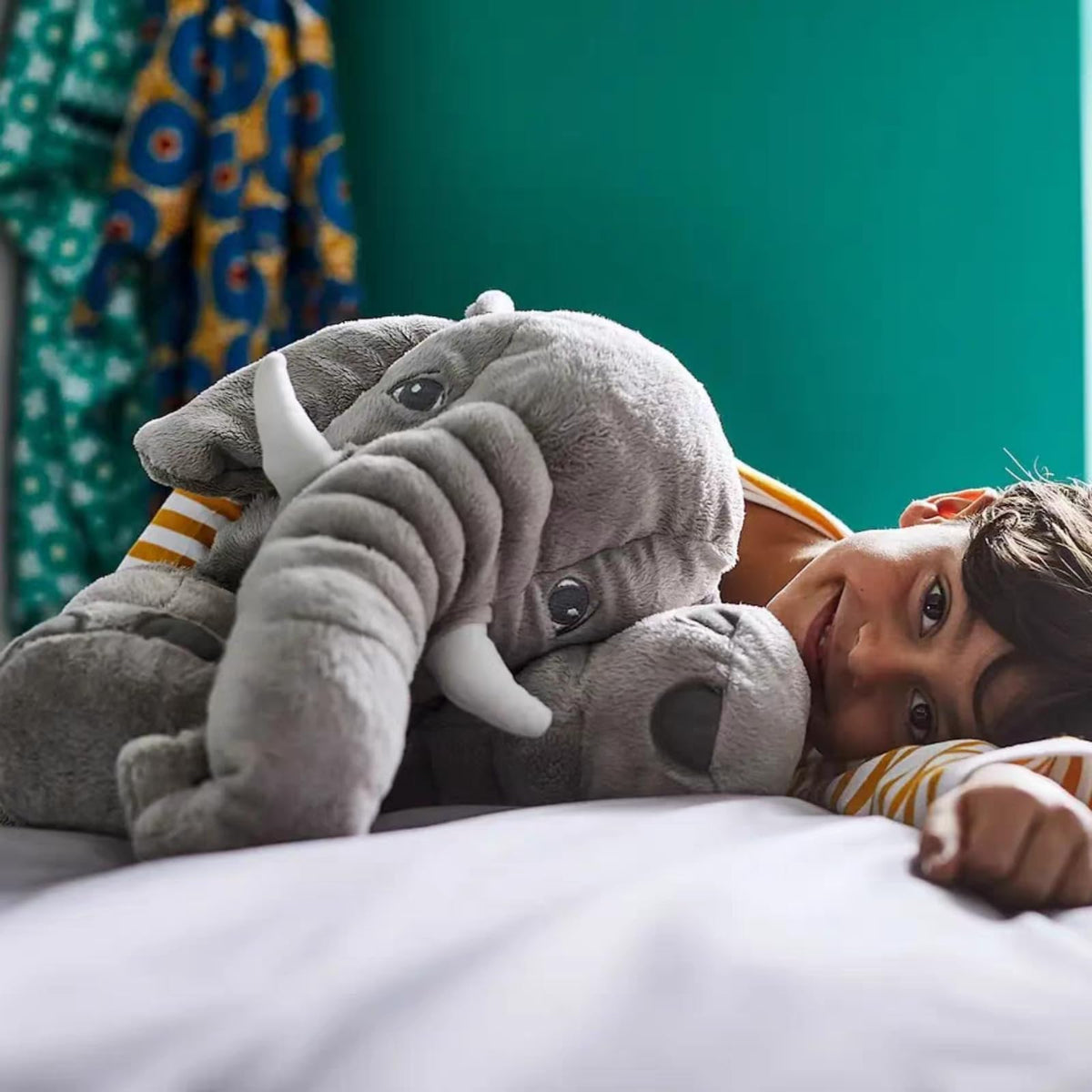 Ryttir 24-inch elephant bedroom comfort, cozy decorative cuddle buddy.