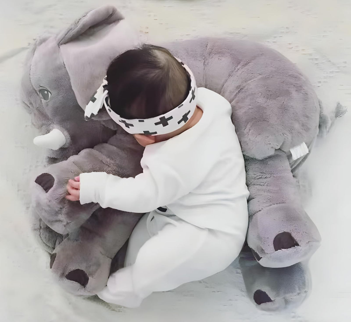 Ryttir 24-inch elephant yoga pose, versatile plush for play.