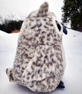 Ryttir Snowy Owl plush wings shown in a dynamic pose for imaginative play.