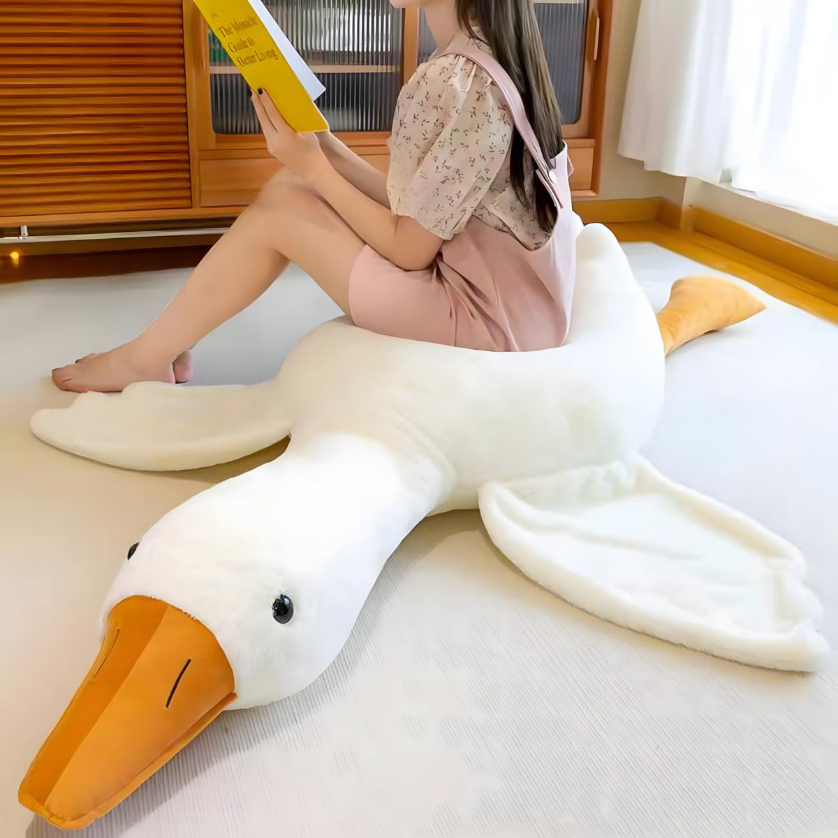 Ryttir Giant Goose Pillow shown on bed to enhance reading corners