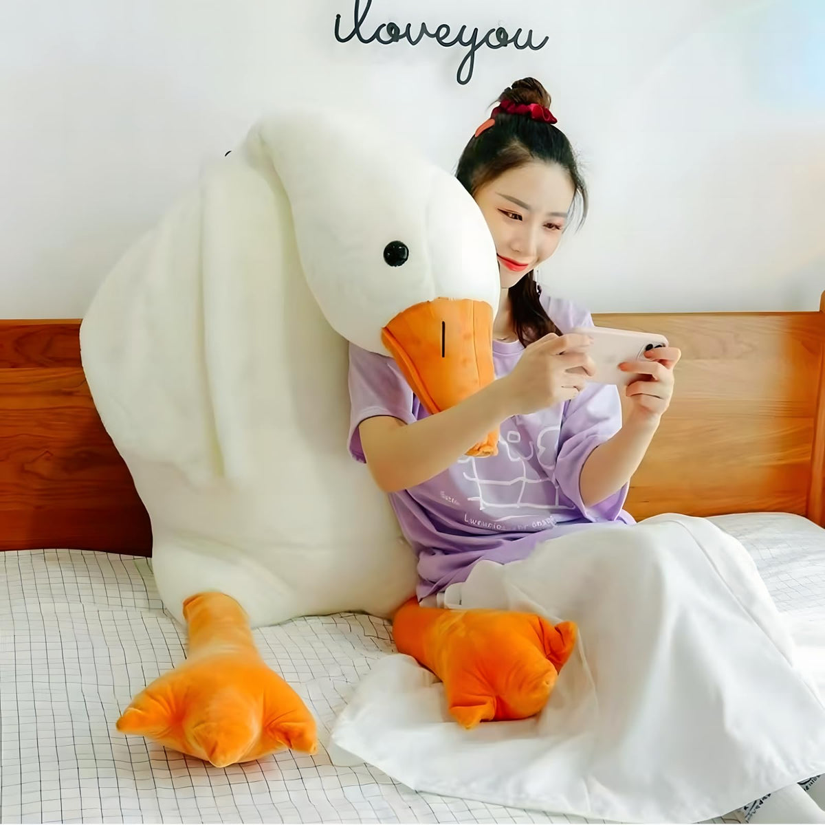 Ryttir goose plush decor offers a versatile neutral white accent