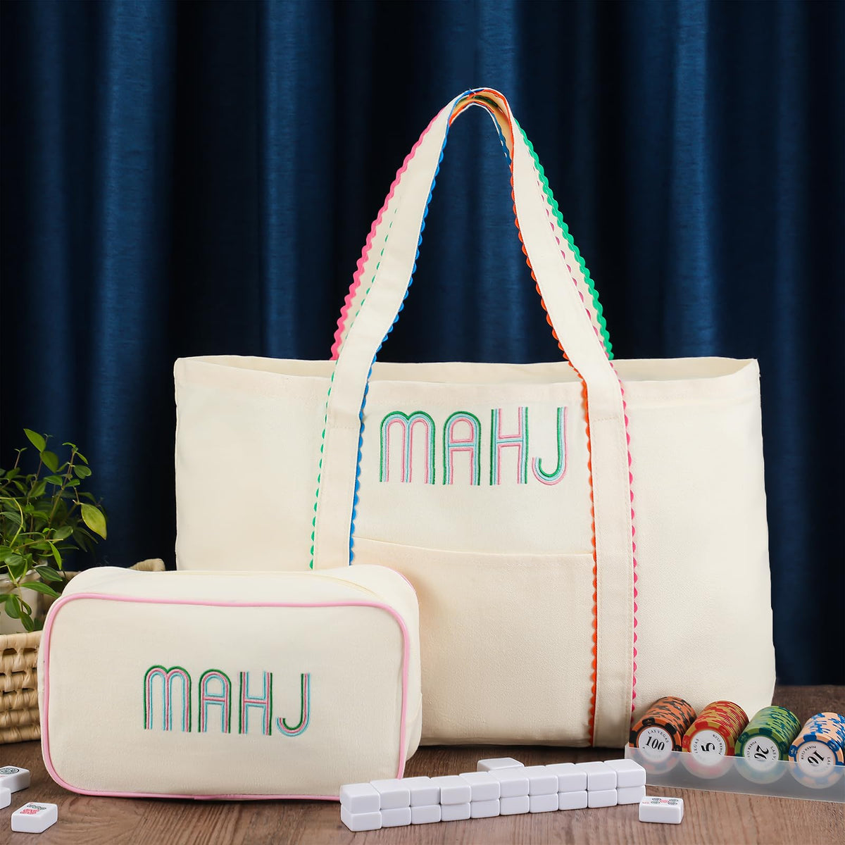 Sadnyy embroidered mahjong canvas tote; refined design plus durable construction.