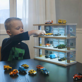 Saichotoy LED lighting enhances hot wheels case for dramatic display at night.