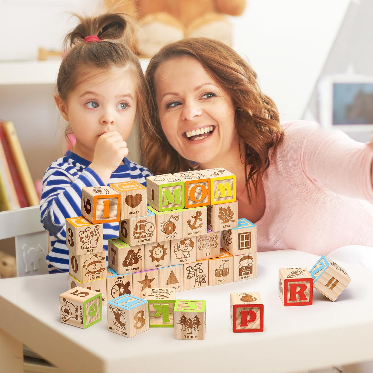 Close-up of smooth natural wood on SainSmart Jr blocks highlights solid construction.