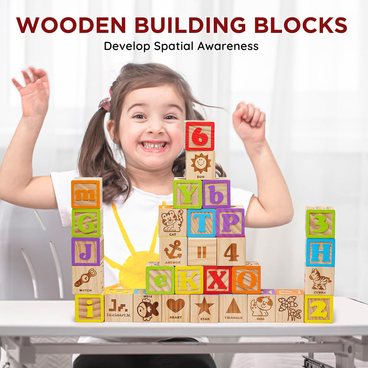 SainSmart Jr blocks in hand show easy-grip design for little fingers.