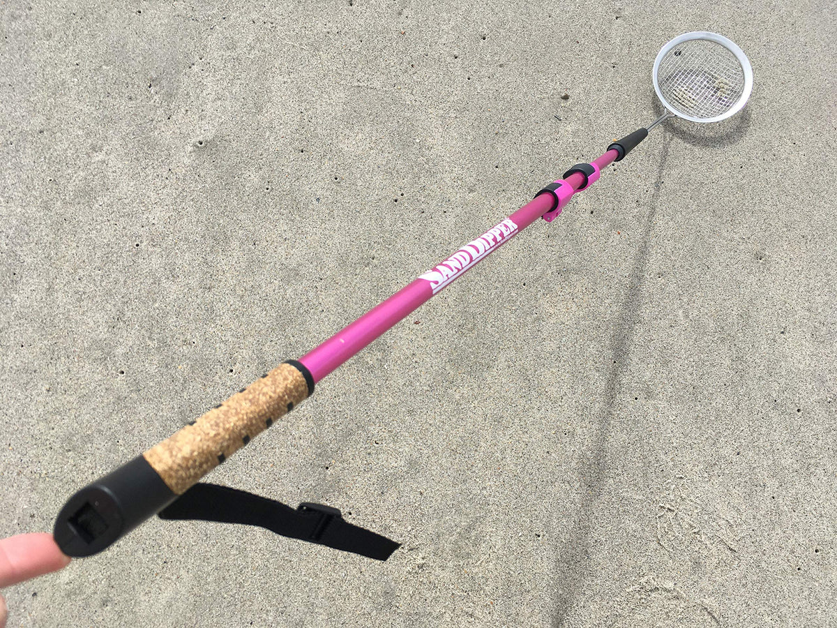 Sand Dipper pink full-size beach scoop ready for treasure hunting.