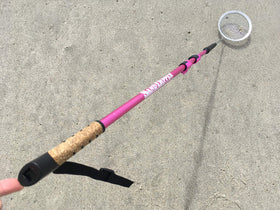 Sand Dipper pink full-size beach scoop ready for treasure hunting.