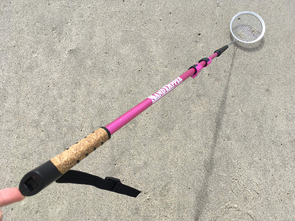 Sand Dipper pink full-size beach scoop ready for treasure hunting.