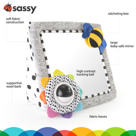 Sassy easel-back floor stand supports stable playtime and safe viewing.