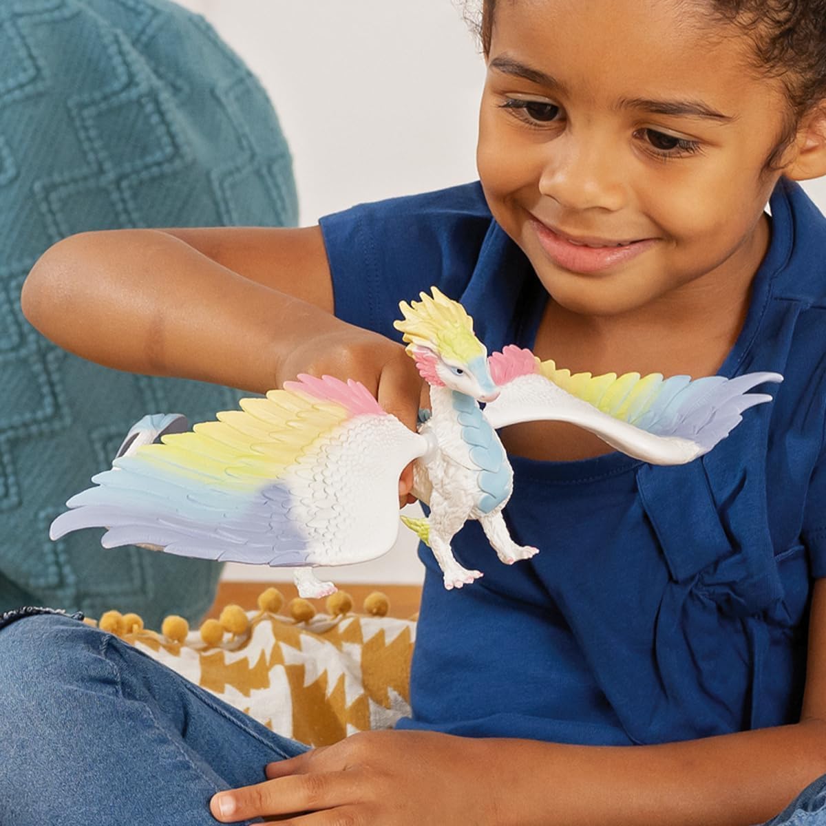 Rainbow Dragon with 12-inch wingspan enables flight-style play.