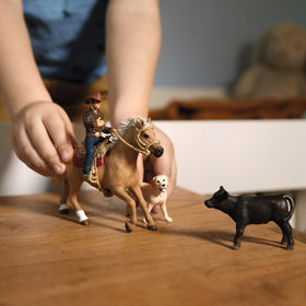 Schleich cowboy rider figurine adds authentic Western charm to playtime.