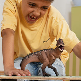 Schleich Giganotosaurus massive figure inspires epic dinosaur battles and stories.
