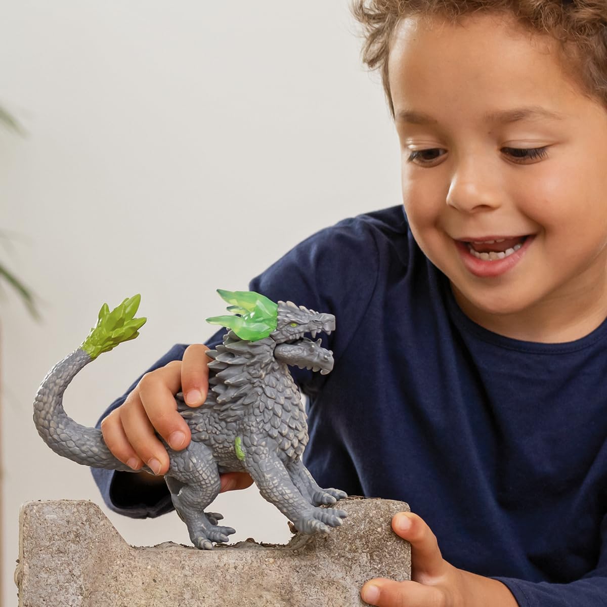 Schleich Eldrador Stone Dragon wings shown in a dramatic, detailed pose.