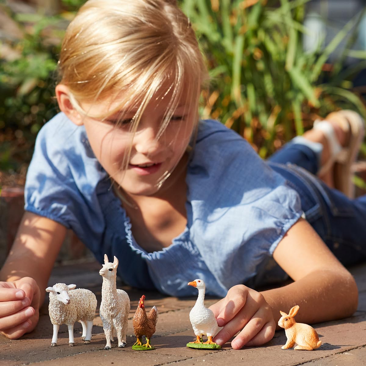 Schleich Farm World sheep figurine with fluffy wool for tactile pretend farming.