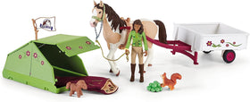 Sarah riding the Pinto mare figure for engaging storytelling.