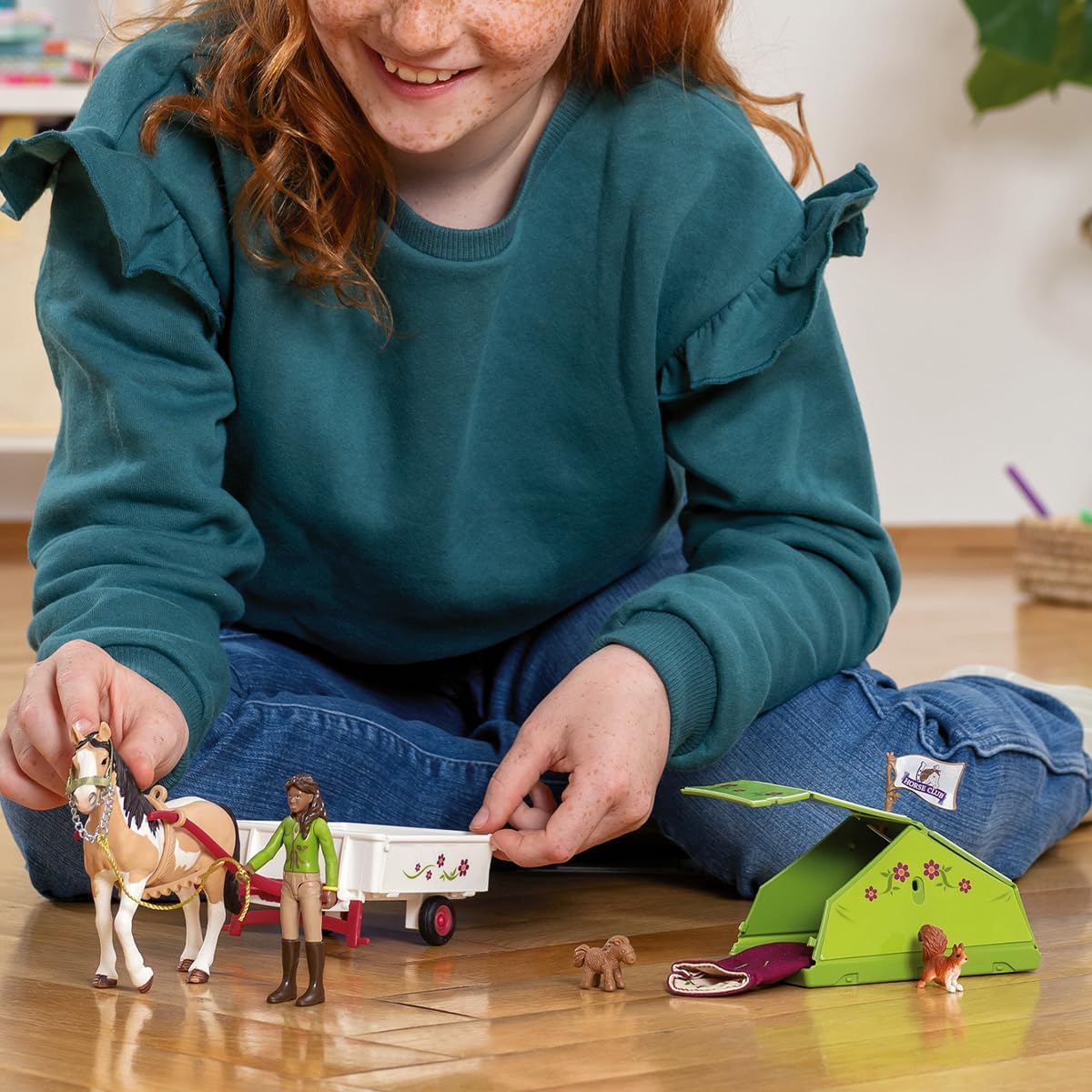 Sarah rider figure pairs with the Pinto mare for interactive scenes.