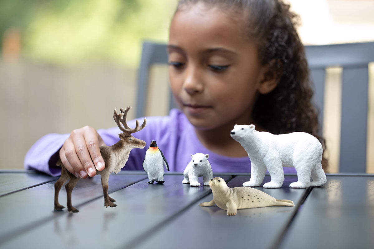 Schleich Wild Life reindeer figurine enhances snowy roleplay and storytelling.