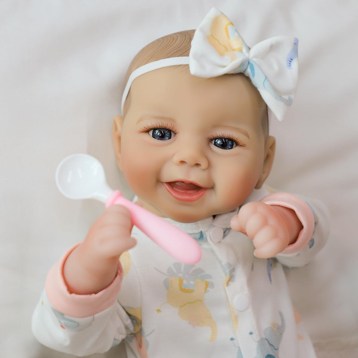 SCOM doll girl features hand-painted hair for a natural baby look.