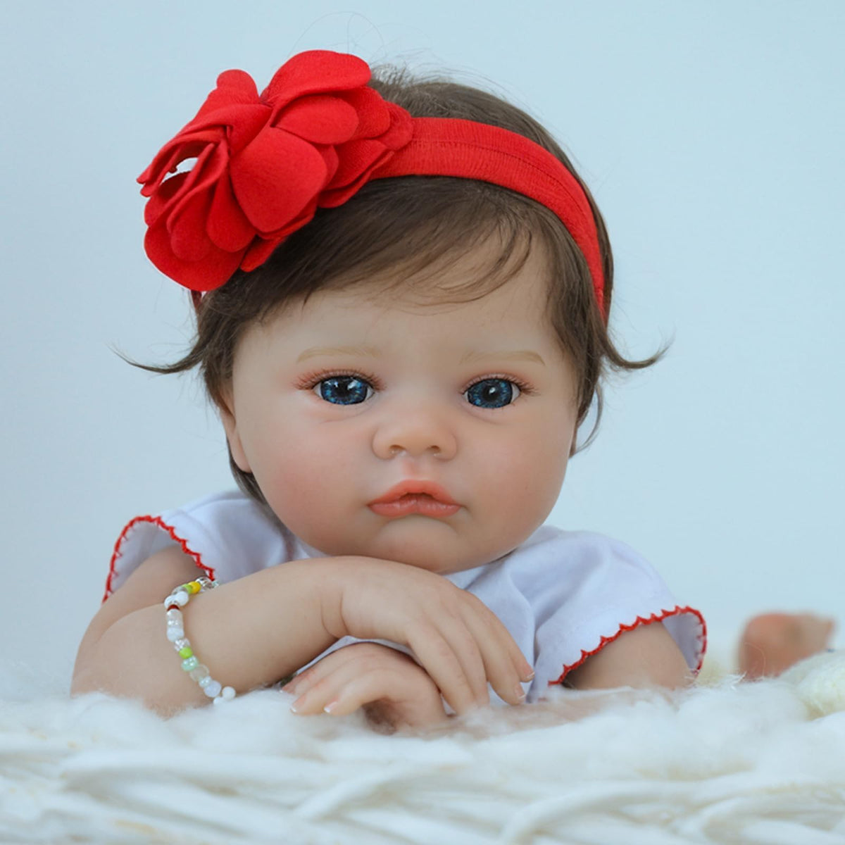 SCOM lifelike baby doll 18-inch size suitable for outfit changes.