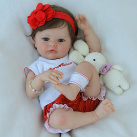 SCOM lifelike baby doll soft body ideal for cuddling.