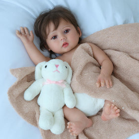 SCOM Lucy with pacifier and bottle supports nurturing play