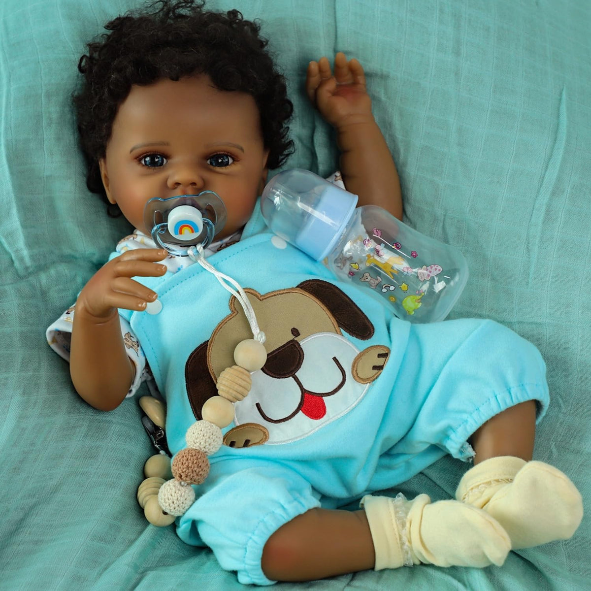 SCOM Quinbee face detail on the 20-inch black reborn doll for lifelike play.