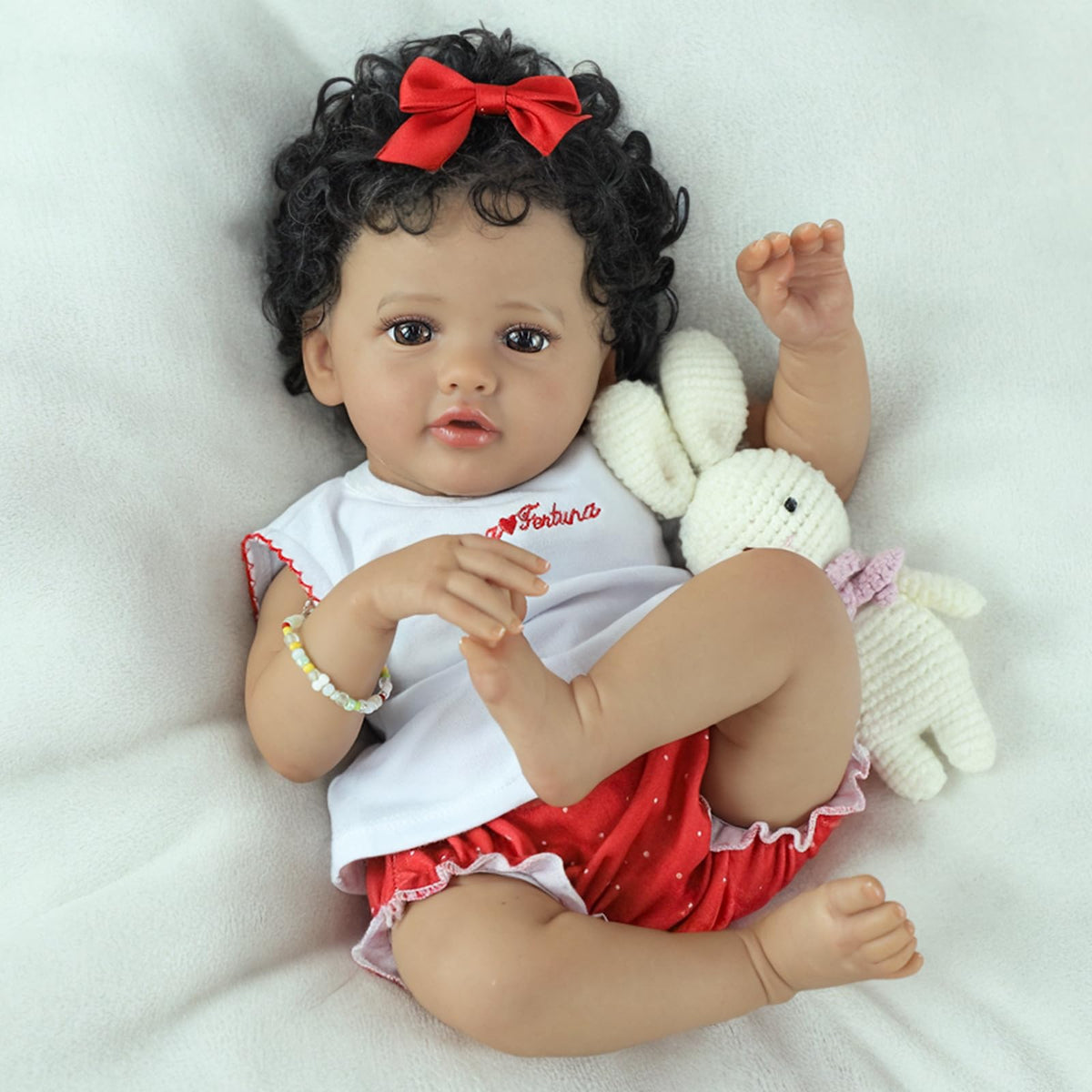 SCOM Reborn dolls with hair accessories and outfits for creative styling.