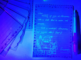 SCStyle batteries installed in invisible ink pen for immediate use.