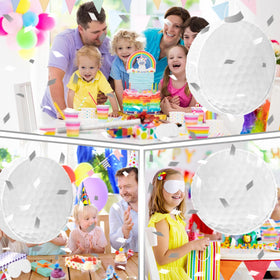 Seenelling golf ball piñata side with hole opening for stuffing treats.