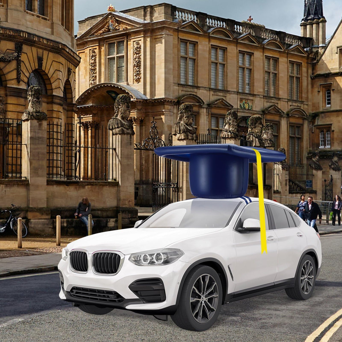 Seenelling inflatable graduation cap inflated on car roof for event display