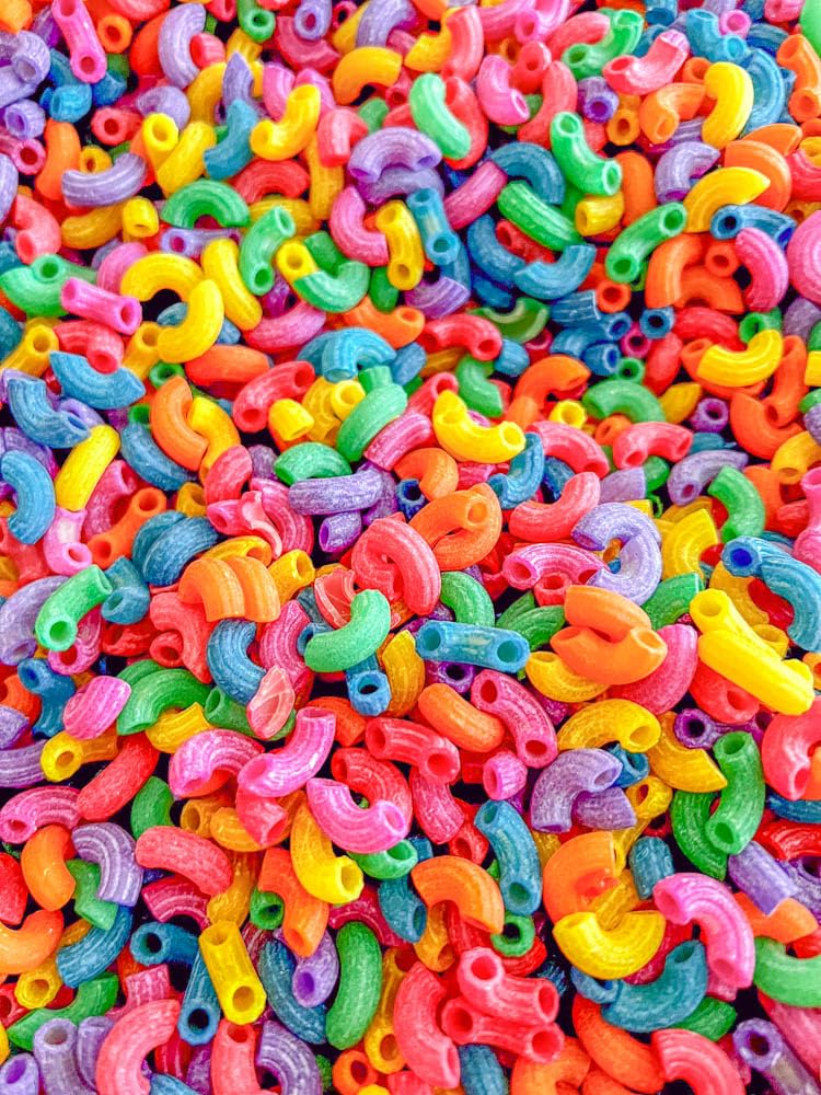 Sensory-N-Stuff rainbow elbow pasta is non-toxic and safe for curious little hands.