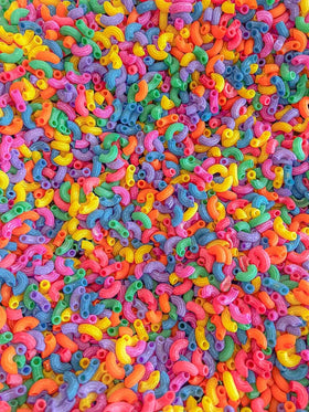 Sensory-N-Stuff rainbow elbow pasta supports scooping and sorting activities.