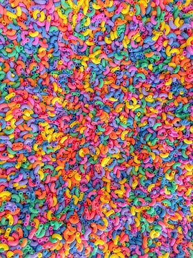 Sensory-N-Stuff rainbow elbow pasta is ideal for themed activities and invitations.