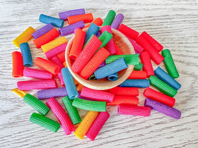 Rainbow Pasta in a sensory bin ready for imaginative, dry exploration