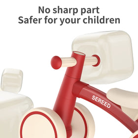 Toddler riding SEREED balance bike indoors demonstrating versatile learning space
