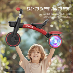 SEREED Child enjoying a ride on the colorful tricycle