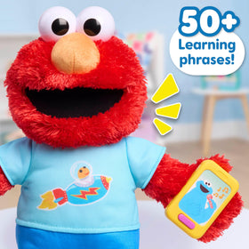 Sesame Street Elmo foot-press teaches numbers and letters through playful prompts.