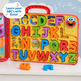 Colorful shelves on the bus support spelling and word-building.