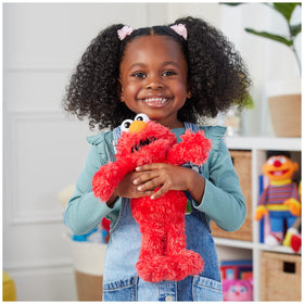 Sesame Street Elmo plush soft fur invites gentle touch and cozy snuggle moments