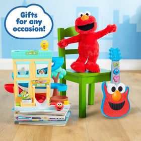 Sesame Street Elmo Slide plush made with soft fabrics and recycled fill for cozy, eco-conscious play.