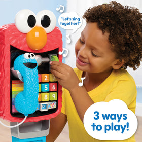 Sesame Street Elmo’s Sing & Learn Playphone receiver close-up with Cookie Monster theme