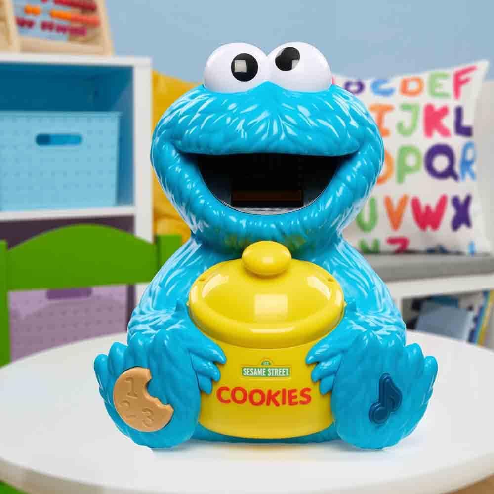 Sesame Street music-note button enables a fun sing-along with Cookie Monster.