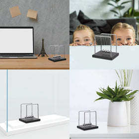 SEVNPRIME gravity demonstration balls shown on a tidy desk setup.